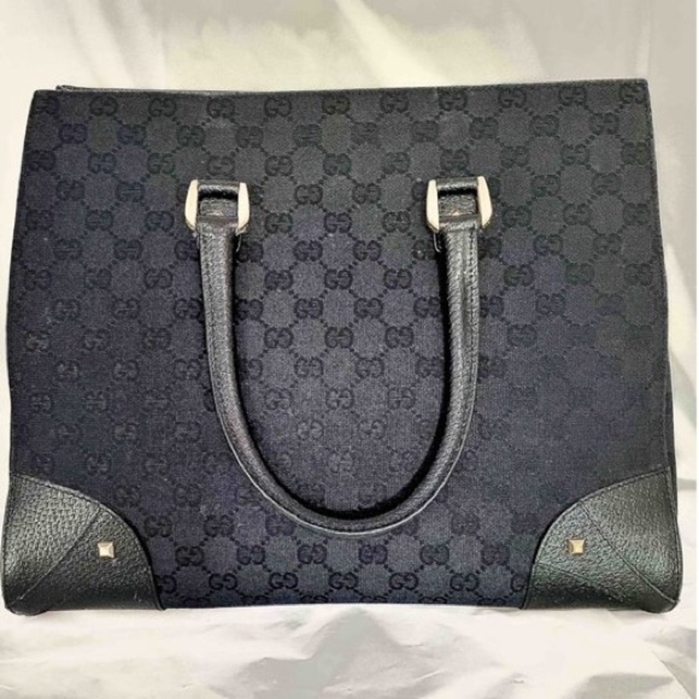 Gorgeous, classic vintage monogramed Gucci nailhead tote with matte gold accents